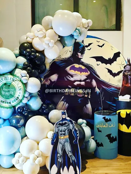 A close-up of the main Batman cutout against the full moon backdrop, showing the impressive scale of the design.