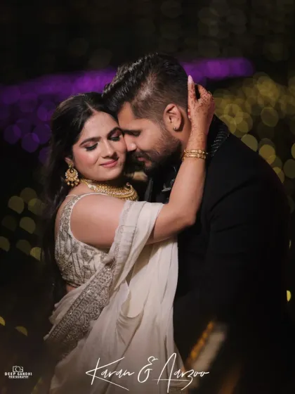 A romantic embrace between the couple during their outdoor engagement party. The soft lighting and their close connection make this a beautiful, heartfelt image.