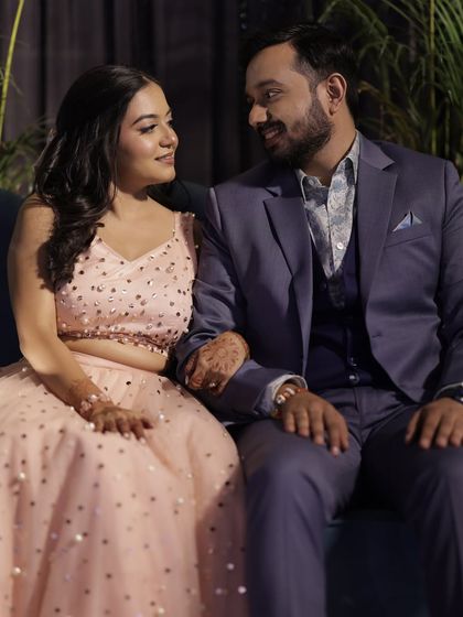 A sweet candid of the couple. My goal is to make you feel so comfortable and beautiful that you forget you're even wearing makeup.