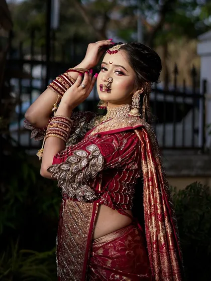 A powerful and confident pose from the bride, showcasing her complete look with attitude and grace.