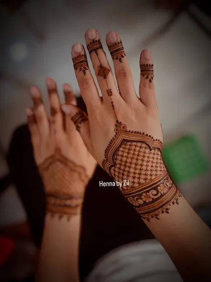A chic and modern design for an engagement bride, featuring a stylish cuff pattern on the wrist.