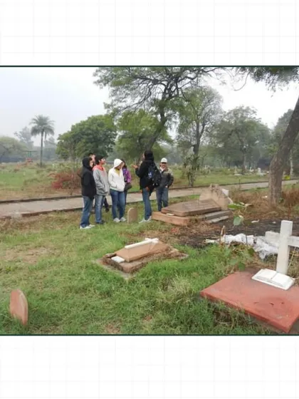 Exploring the less-visited parts of Nicholson Cemetery. The variety of tombstones, from simple crosses to elaborate monuments, speaks to the different lives of those buried here.