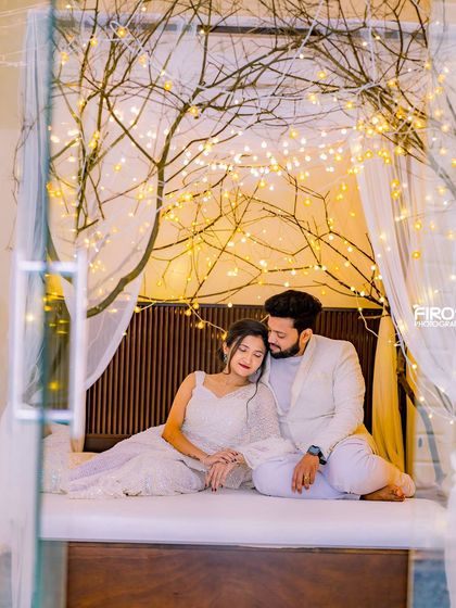 An all-white themed shoot in our cozy indoor bed set, creating a serene and dreamy atmosphere.