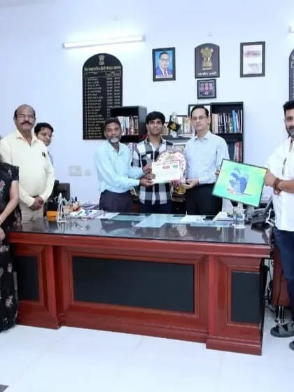 A proud moment for me, receiving an award from the District Collector in Banswara. It's an honor to be recognized for my art.