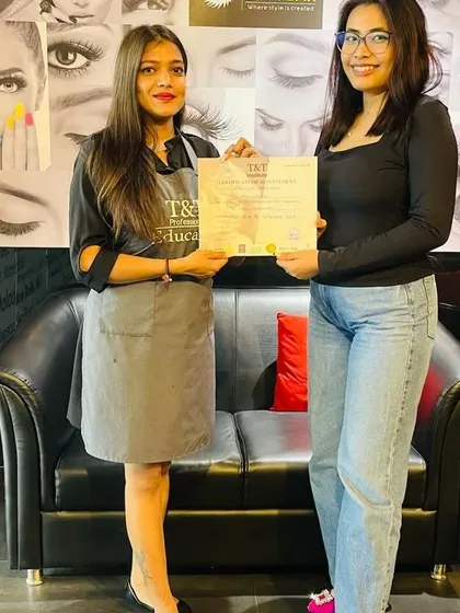 A proud moment for our student and our educator. Handing over the certificate is the final step in their transformation into a professional nail technician.