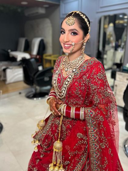 The bride's happy smile is the best testimonial. She looks absolutely beautiful and ready for her big day.