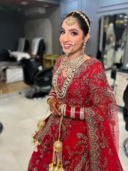 The bride's happy smile is the best testimonial. She looks absolutely beautiful and ready for her big day.