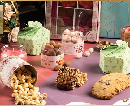 A closer look at our exclusive Diwali luxury boxes, featuring nuts, granola bars, cookies, and fragrant potpourri. These hampers are designed to treat your loved ones like royalty.