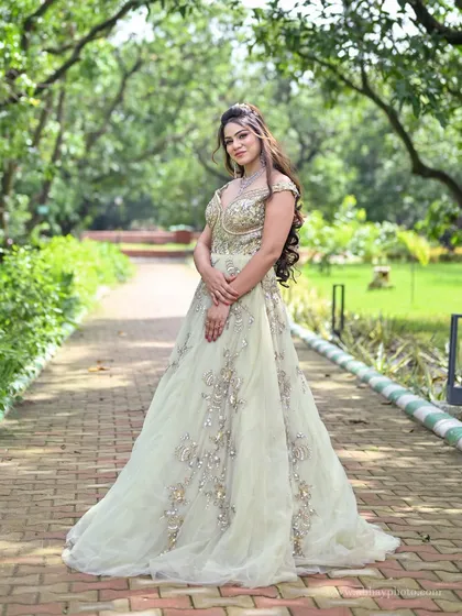 Feel like a princess in this breathtaking pastel gown, perfect for a reception or engagement. The intricate embroidery and flowing silhouette create a magical look, ensuring all eyes are on you.