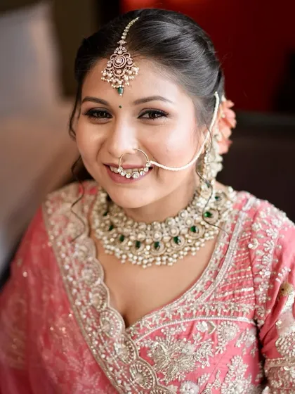 A happy bride is the most beautiful bride. This close-up shows her flawless base and the soft definition around her eyes, creating a timeless look.