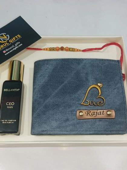 A simple Rakhi gift set with a personalized wallet and a Rakhi.