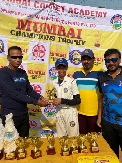 Tanish Salunke receiving the 'Best Batsman' award at the Mumbai Champions Trophy.