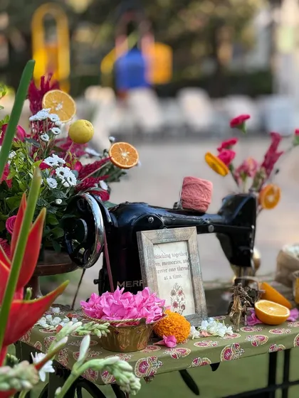 A fragrant welcome blending tradition and vintage charm. We styled this jasmine station on an antique sewing machine, creating a unique focal point that honors heritage with an artistic twist.