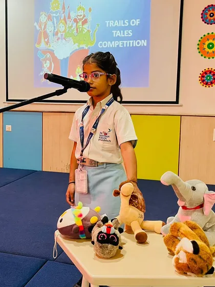 Using a collection of animal puppets, a student weaves a creative story. Props like these make storytelling interactive and help children develop their imagination and narrative abilities.
