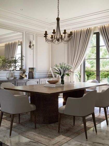 A dining experience framed by large windows and heavy drapes. The design uses natural light to create a bright and welcoming atmosphere, while the dark wood sideboard provides ample storage and a surface for serving.