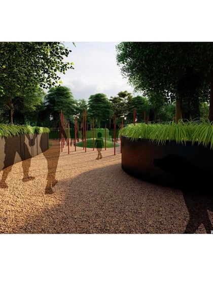 A conceptual view of the walkway for the 'Indian Garden of Peace'. The design uses layered walls and vertical elements to create a sense of passage and enclosure, guiding visitors through the memorial landscape.