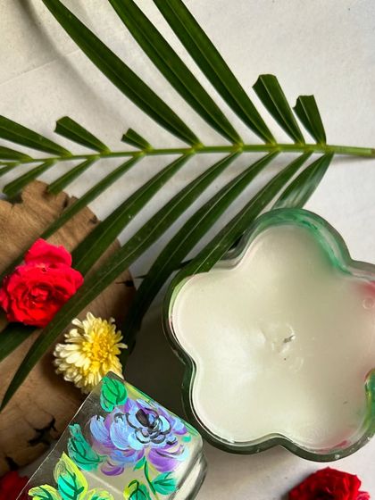 A flower-shaped candle, another one of our unique festive offerings.