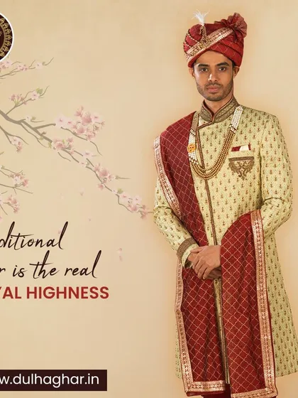 Traditional wear is the real royal highness. This cream sherwani with a rich maroon stole and safa is a testament to the grandeur of Indian heritage.