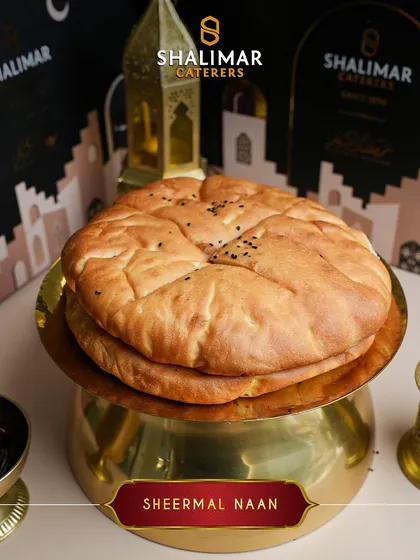 No Indian feast is complete without the right bread. Our soft and slightly sweet Sheermal Naan is the perfect accompaniment to our rich and savory Mughlai curries.