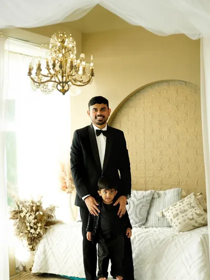 A handsome duo. We love capturing the special bond between fathers and sons, especially during a maternity session that celebrates the entire family's journey.