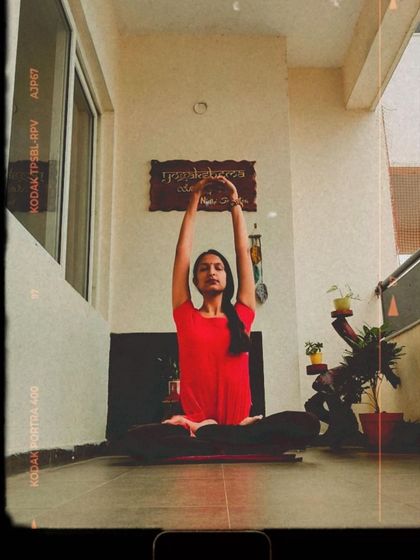 Stretching is a constant in all forms of yoga, from traditional to modern. A simple seated stretch like this one is a great way to strengthen the body and stay flexible.