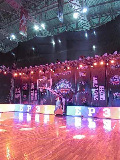 A view of the court setup for the EP3L half-court tournament. The stadium is fully equipped with banners, digital scoreboards, and professional lighting rigs for high-stakes events.
