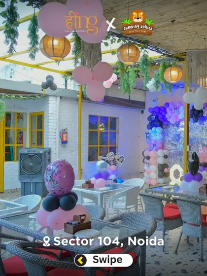 The dining area decorated for a Kuromi-themed party, with black, pink, and purple balloons creating a fun and stylish atmosphere.