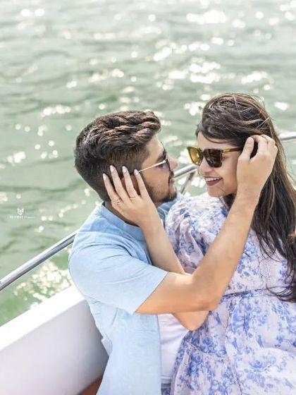 A close-up shot capturing a sweet, loving gaze between the couple on the boat. These are the moments that truly tell your love story.