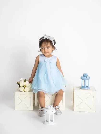 A candid moment of a little girl in a simple, clean setup. Sometimes the quiet, in-between moments are the most beautiful.