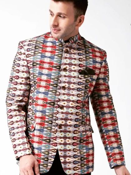 A vibrant and unique printed Jodhpuri jacket. The colorful geometric pattern makes it a standout piece for a sangeet or mehendi party. Pair it with black trousers for a balanced look.