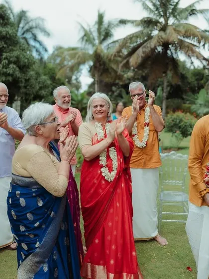 A beautiful moment from a cross-cultural wedding, where families from two different countries come together. We excel at capturing the unique blend of traditions and the universal language of love and celebration.