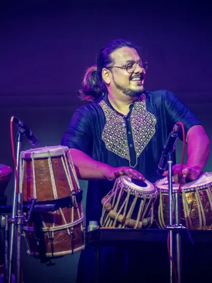 The joy on our percussionist's face is infectious. We love sharing our music.
