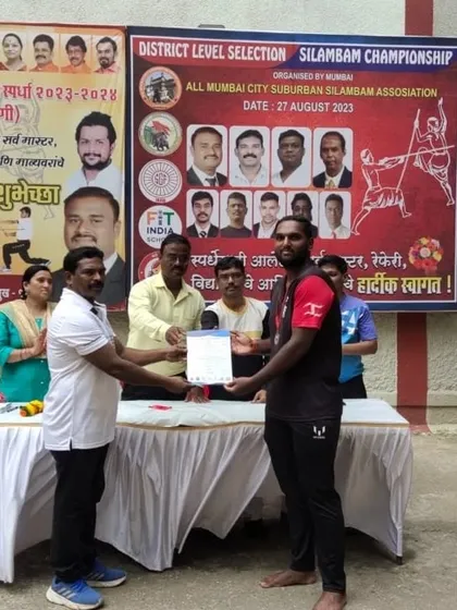 Another student from my team being recognized for his performance in the long stick fighting competition. This is the result of hard work and dedication.