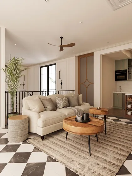 This inviting family lounge on an upper floor features striking black-and-white flooring that anchors the space. We used soft white walls, warm wood tones, and comfortable furnishings to create a cozy, self-contained retreat for relaxation.