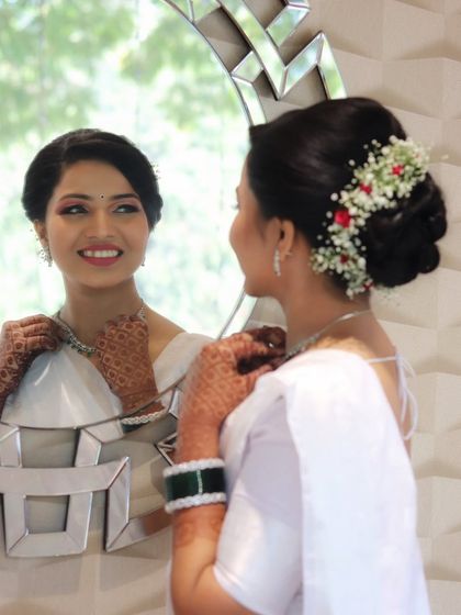 The moment a bride looks in the mirror and smiles, seeing her complete look for the first time. Her happiness and confidence are what make everything worthwhile.