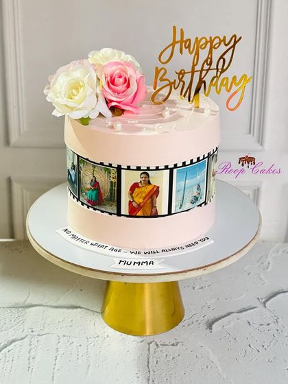 A reel of sweet memories for Mumma's birthday. This cake features an edible photo strip with cherished family pictures, combining modern personalization with a classic, elegant design.