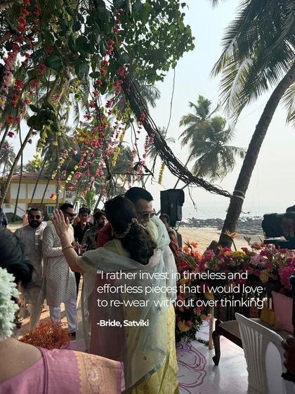 A candid moment of the bride embracing a guest, her philosophy of investing in timeless, re-wearable pieces shining through.