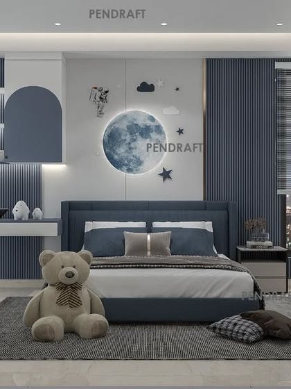 A celestial-themed kids' room designed in shades of blue and grey. The focal point is a large moon-shaped light, creating a dreamy atmosphere for a young child.