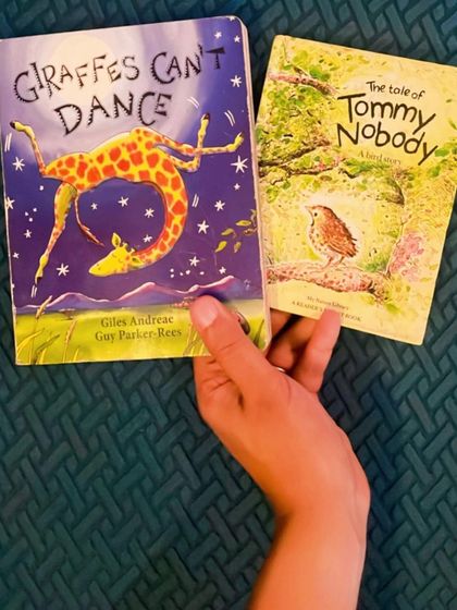 'Giraffes Can't Dance' and 'The Tale of Tommy Nobody'. Both are beautiful stories about finding your own song and embracing what makes you different.