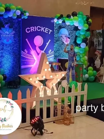 A side view of the cricket stage, highlighting the layered backdrops and the large, illuminated number '9'.