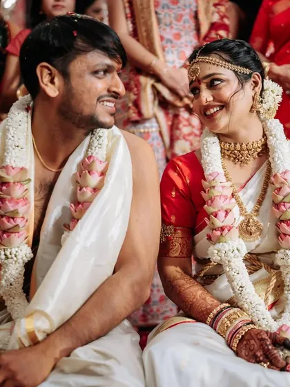 A beautiful moment between the South Indian couple during their wedding rituals.