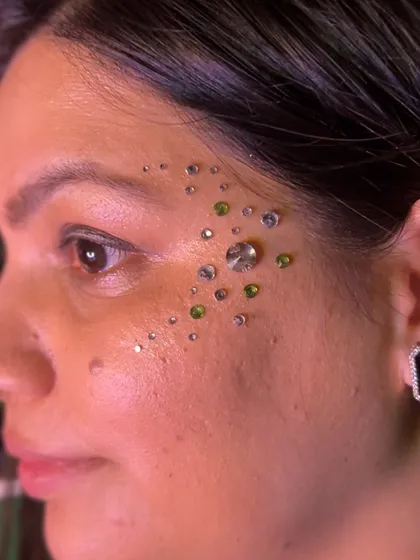 Adding a pop of colour with these green and clear rhinestones. I love creating custom gem clusters that match my client's outfits or their mood.