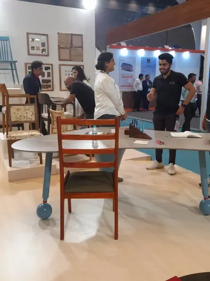 The booth saw a steady stream of visitors, all interested in seeing our unique, custom-made furniture in person.