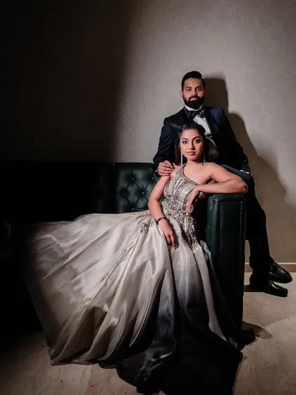 A full-length portrait showcasing the couple's stunning after-party attire. This shot is all about capturing their style, confidence, and the glamour of the evening.