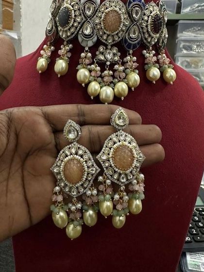 A peach-colored version of the same choker set, showing the versatility of the design.