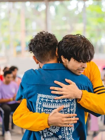 More than a studio, we are a family. Moments like this hug at our Spectra event are what our community is all about: support, connection, and a shared love for dance.