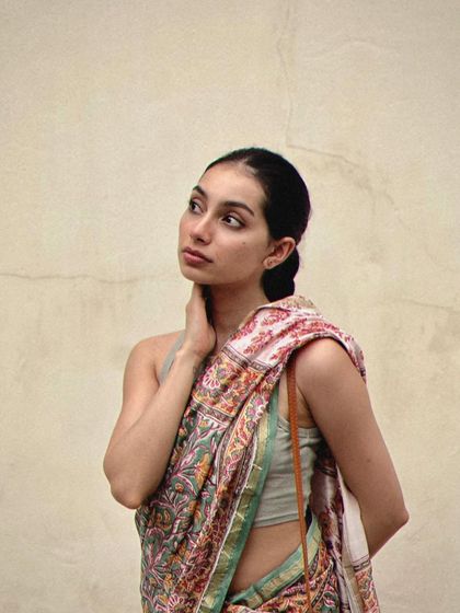 A casual and modern take on saree styling during a day out in Pondicherry. This shows how a traditional saree can be adapted for a contemporary, travel-friendly look.