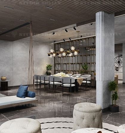 Another view of the Palam Vihar party hall, showing the dining area's proximity to a comfortable lounge space with a large indoor swing.