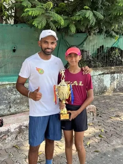 Rumi Gadia with her coach after winning the Under-12 All India Championship Series tournament at P.J. Hindu Gymkhana, Mumbai.