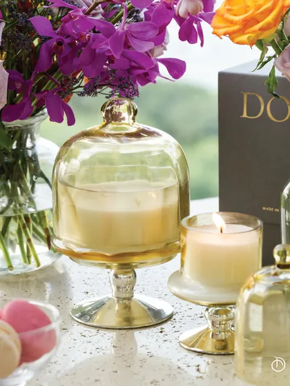 Deck the nooks and corners of your home with my Sundance Aura scented candles. The artfully crafted footed glass bell jars house our balmy Summer Nectar fragrance, instantly enlivening your space with joy and zest for a festive sundowner.